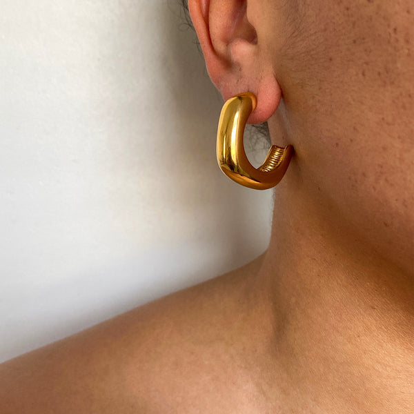 Chunky gold C shaped earrings